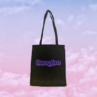 a black tote bag with the word bengfan on it